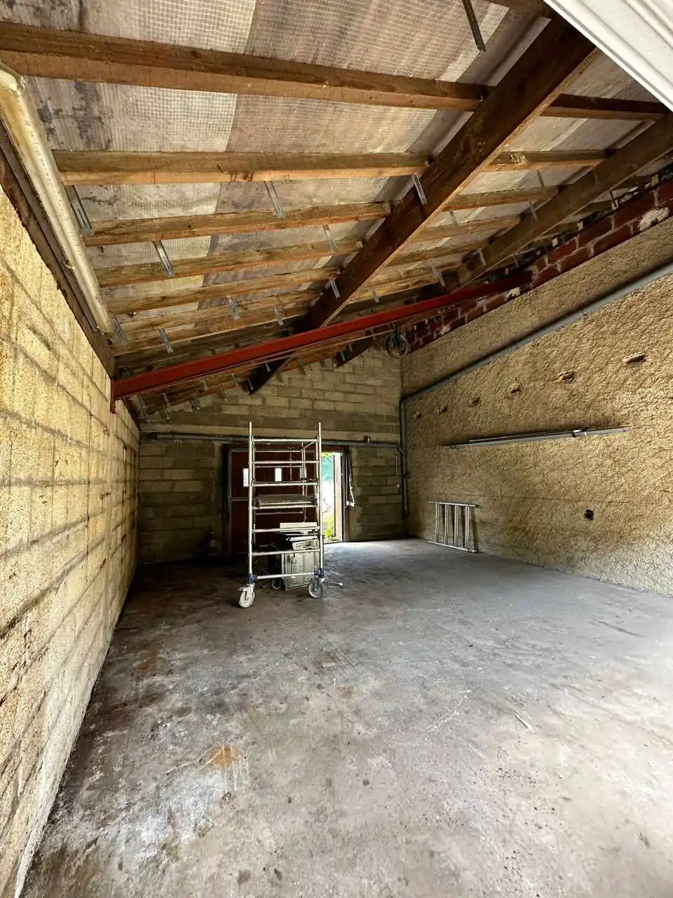 Avant travaux - Transformation d'un garage en studio photo à Maurepas (78)